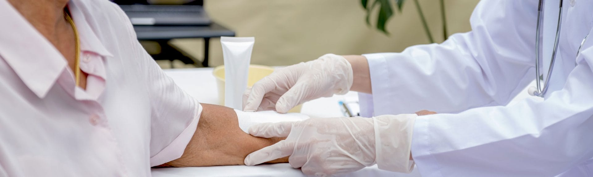 Doctor Applying Bandage